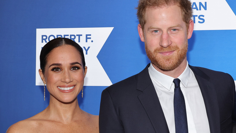 Meghan Markle and Prince Harry posing