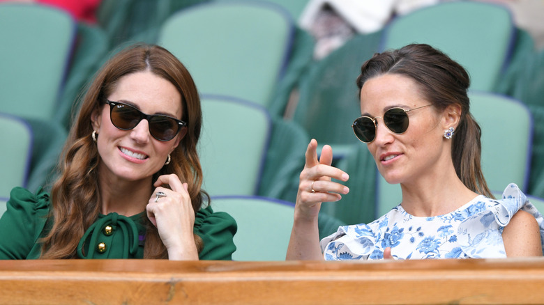 Kate and Pippa Middleton attend past Wimbledon match