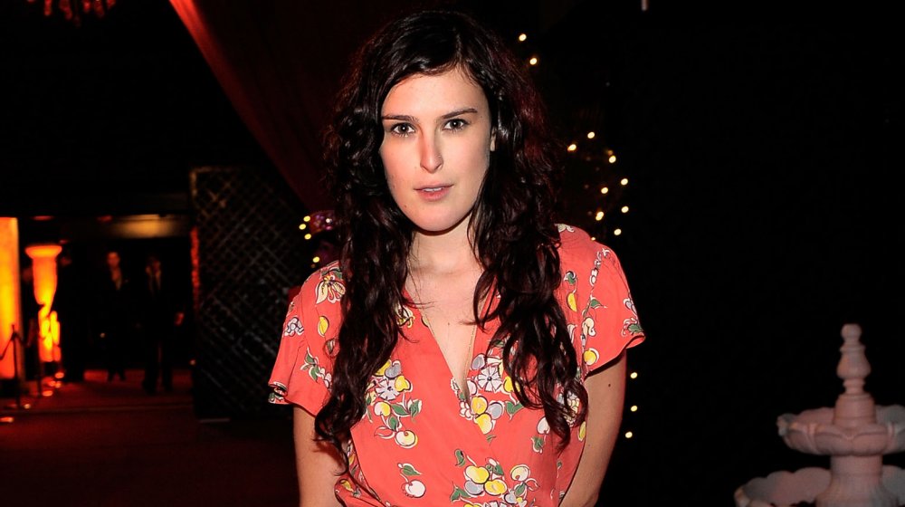 Rumer Willis with long, brunette hair