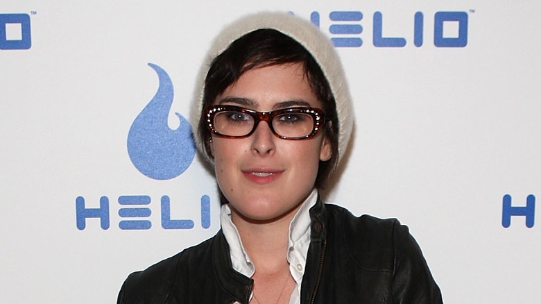 Rumer Willis wearing brown glasses hat