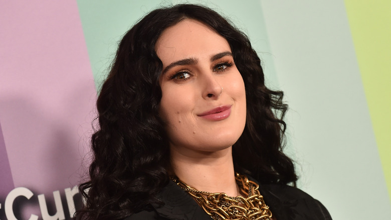 Rumer Willis smirking at the camera