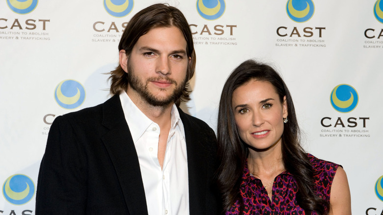 Ashton Kutcher and Demi Moore on step-and-repeat