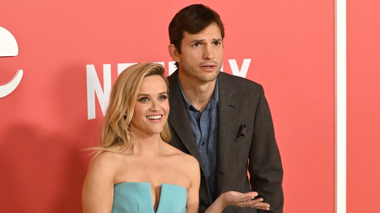 Ashton Kutcher poses with Reese Witherspoon