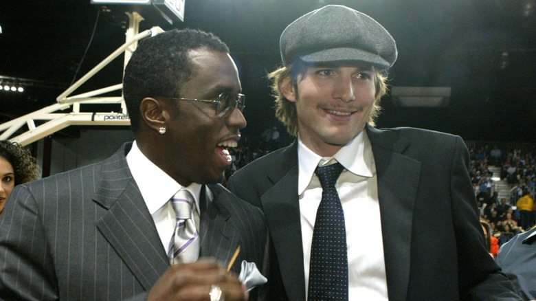 Ashton Kutcher and Diddy at an NBA game