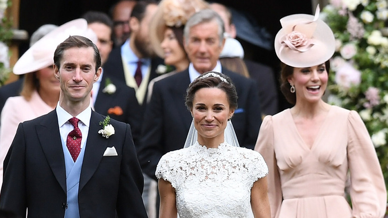 Kate Middleton walks behind Pippa on her wedding day