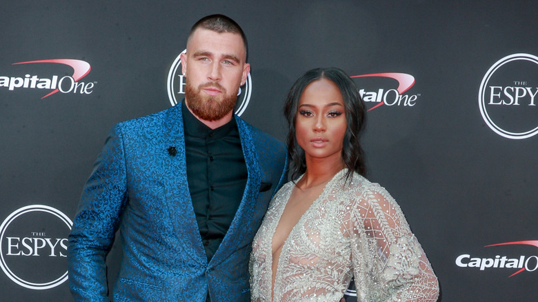 Travis Kelce, Kayla Nicole posing