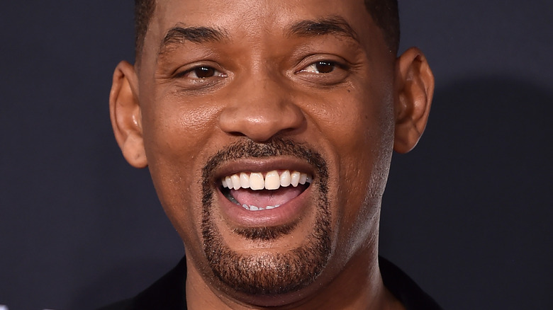 Will Smith smiles with teeth