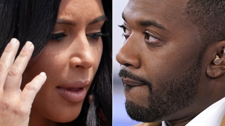 Kim Kardashian hand to face Ray J biting lip