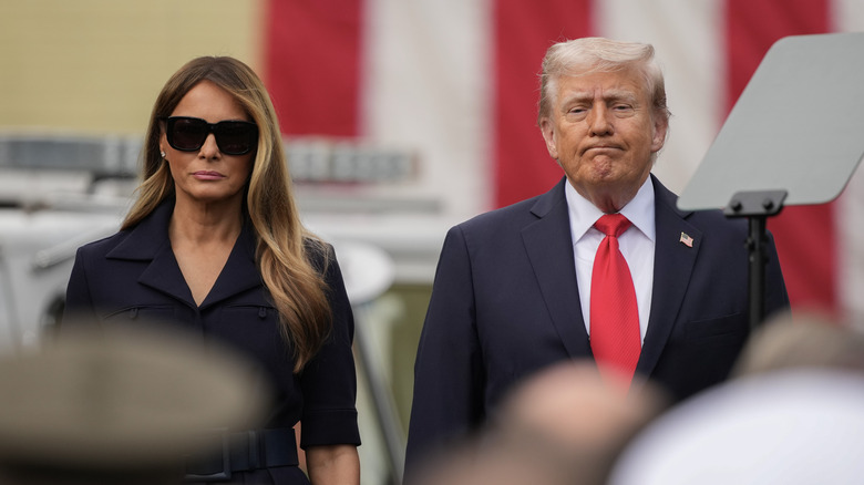 Melania Trump and Donald Trump on 9/11 in front of the U.S. flag