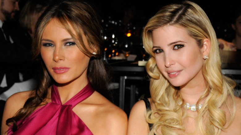 Melania Trump and Ivanka Trump eating dinner at an event
