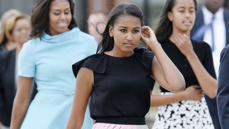 Sasha Obama, Michelle Obama, and Malia Obama arriving to welcome Pope Francis