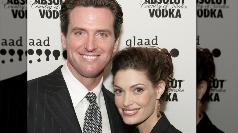 Gavin Newsom and Kimberly Guilfoyle smiling