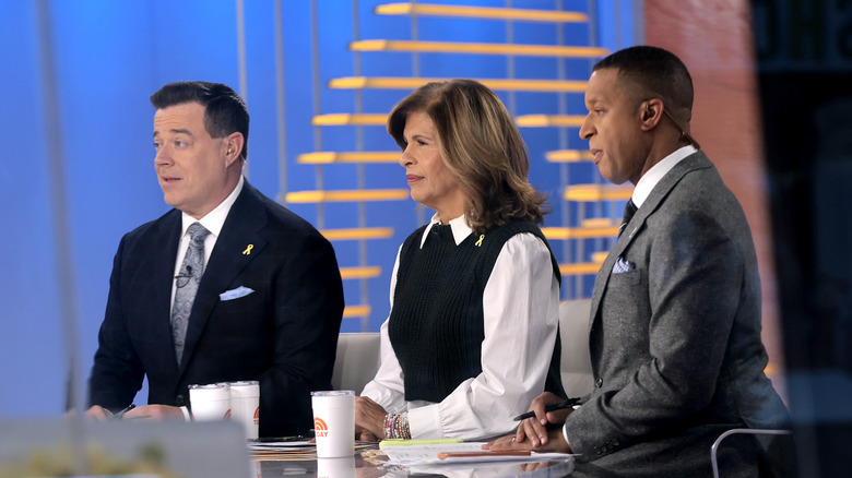 Carson Daly, Hoda Kotb and Craig Melvin filming the "Today" show.