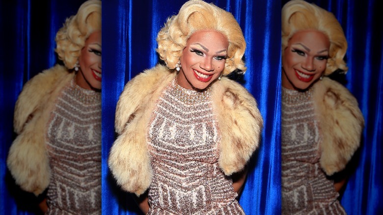 Chi Chi DeVayne grinning