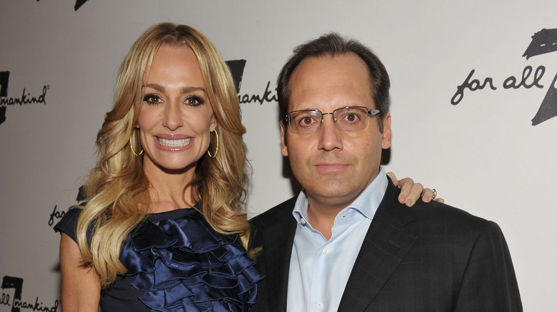 Taylor Armstrong blue dress Russell Armstrong black jacket