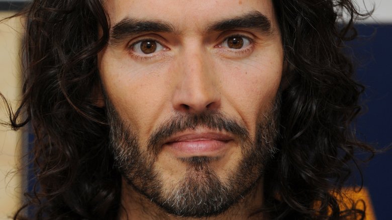 Russell Brand expecting third child with wife Laura Gallacher