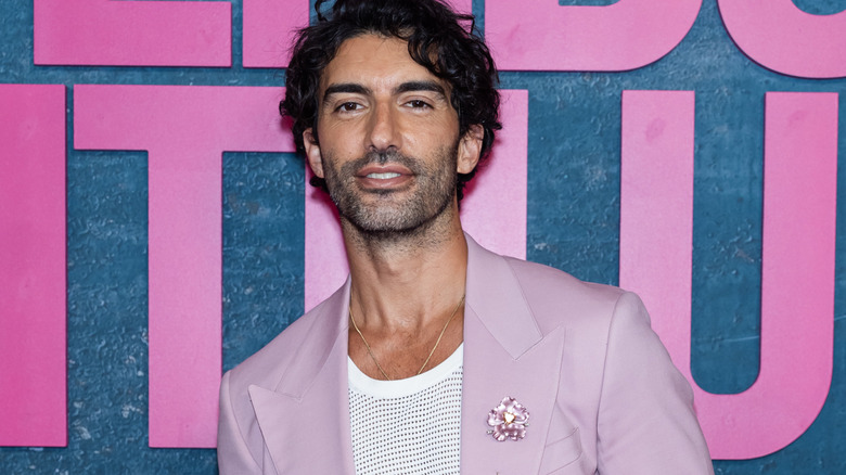 Justin Baldoni in a pink suit