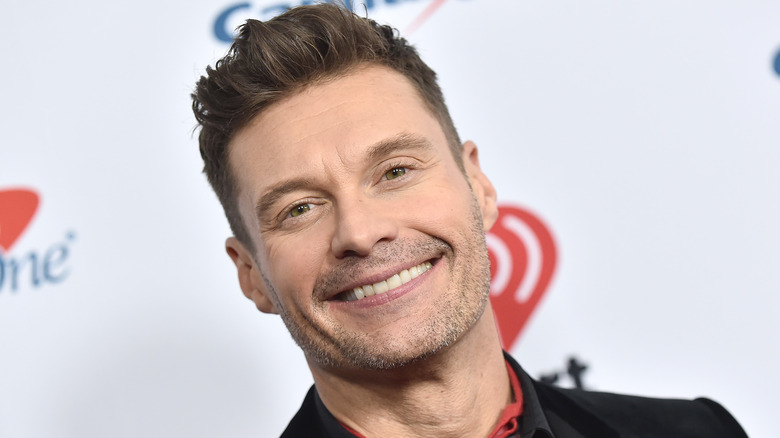 Ryan Seacrest stubble beard smiling