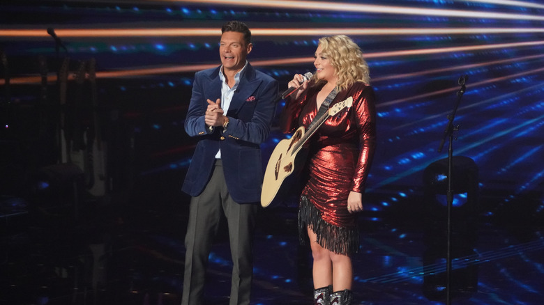 Ryan Seacrest and HunterGirl on American Idol finale stage