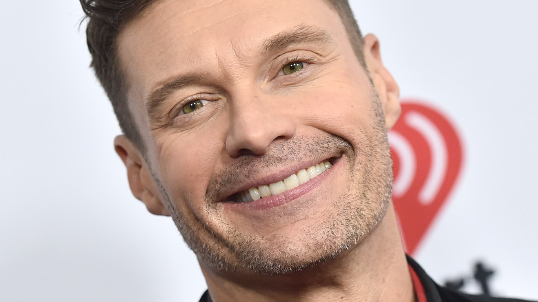 Ryan Seacrest grinning