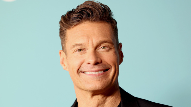 Ryan Seacrest poses in 2024