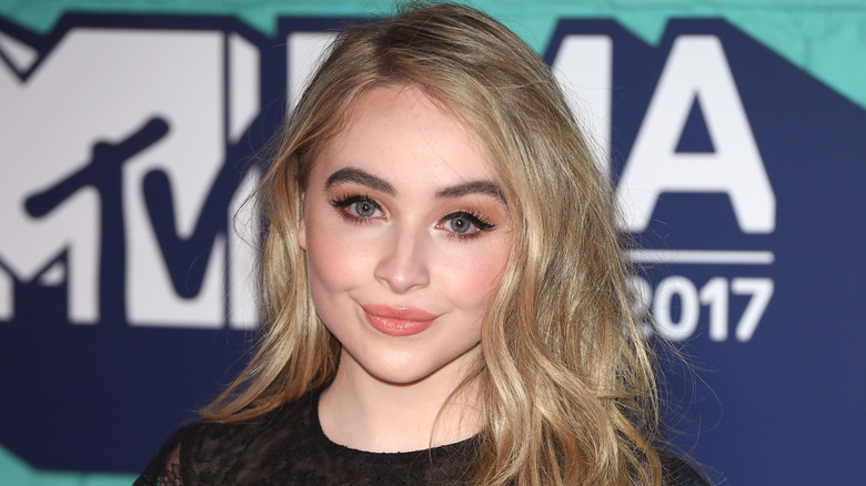 Sabrina Carpenter posing at the 2017 MTV EMAs