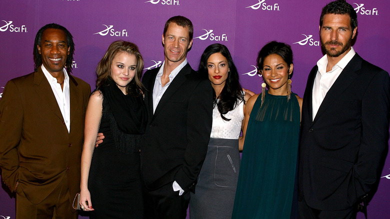 Erica Cerra poses with other Eureka cast members