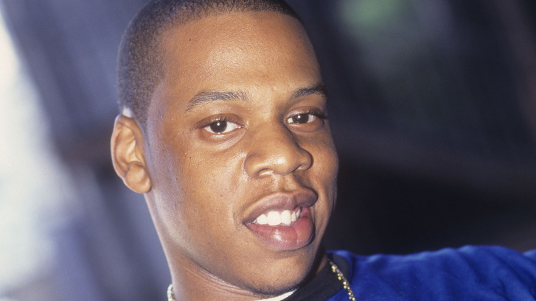 Young Jay-Z gold chain smiling