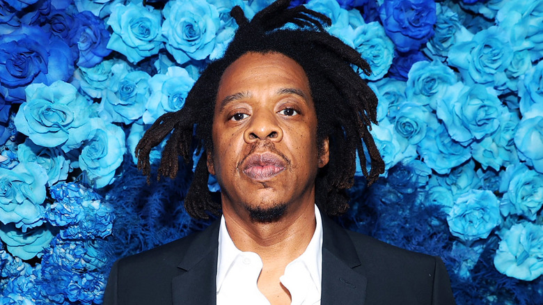 Jay-Z with blue flowers background