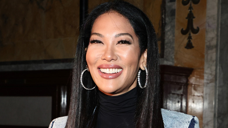 Kimora Lee Simmons silver earrings
