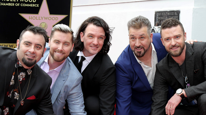 *NSYNC poses at the Hollywood Walk of Fame