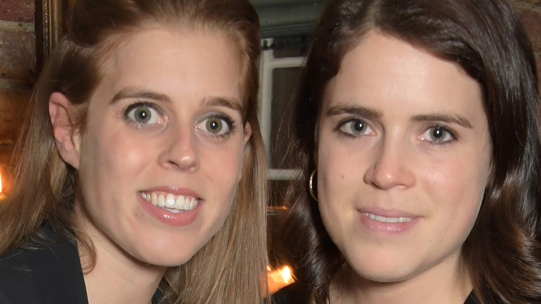 Princess Beatrice and Princess Eugenie posing