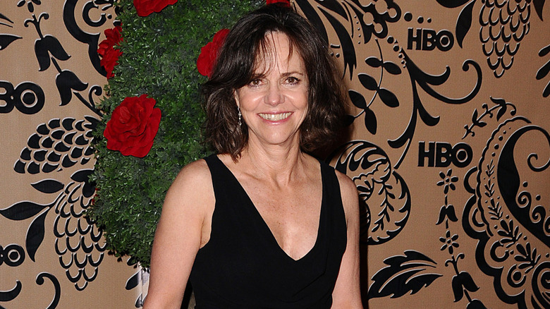 Sally Field smiling on the red carpet in the mid-2000s