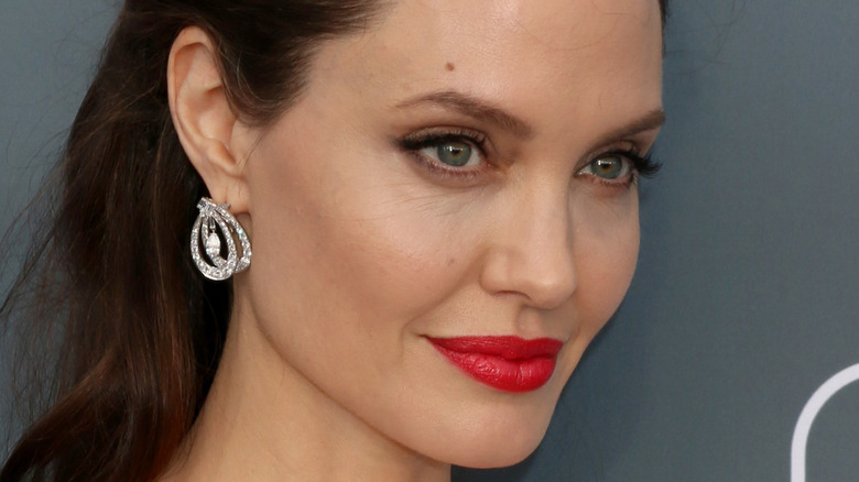 Angelina Jolie poses at an awards show