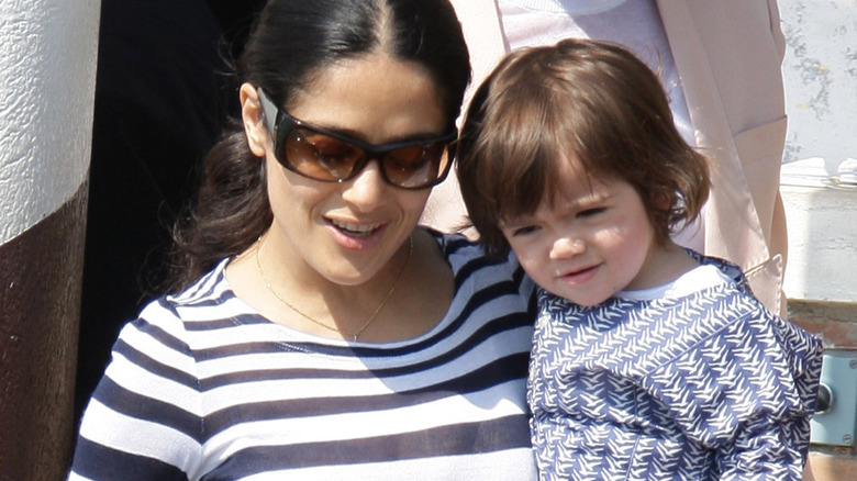 Salma holding her daughter in 2009.
