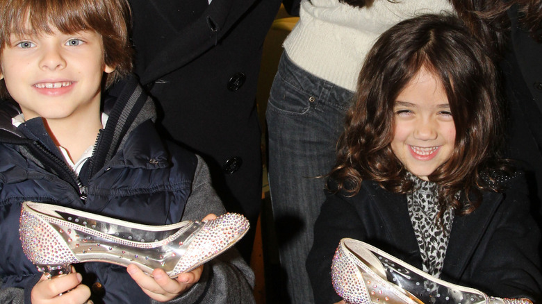 Augustin Evangelista and Valentina Paloma Pinault laugh in 2013
