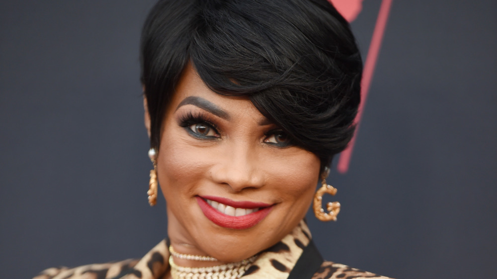 Sandra "Pepa" Denton smiling on the red carpet