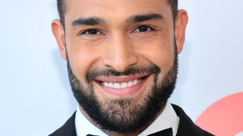 Sam Asghari with beard and bowtie