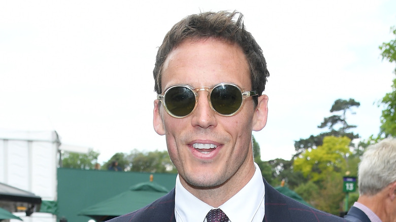 Sam Claflin wearing sunglasses