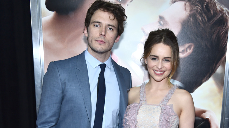 Sam Claflin posing with Emilia Clarke