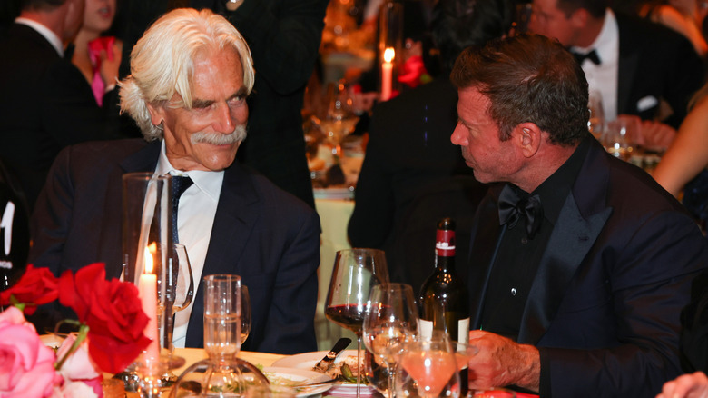 Sam Elliott and Taylor Sheridan sitting together at the Lone Star Film Festival Gala in 2025