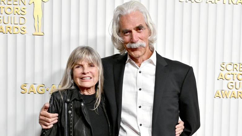 Sam Elliott and Katharine Ross pose with their arms around each other in 2023.