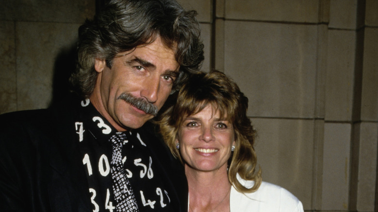 Sam Elliott and Katharine Ross pose by leaning together in 1983.