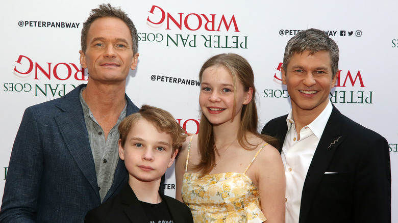 Neil Patrick Harris and David Burtka posing with their kids
