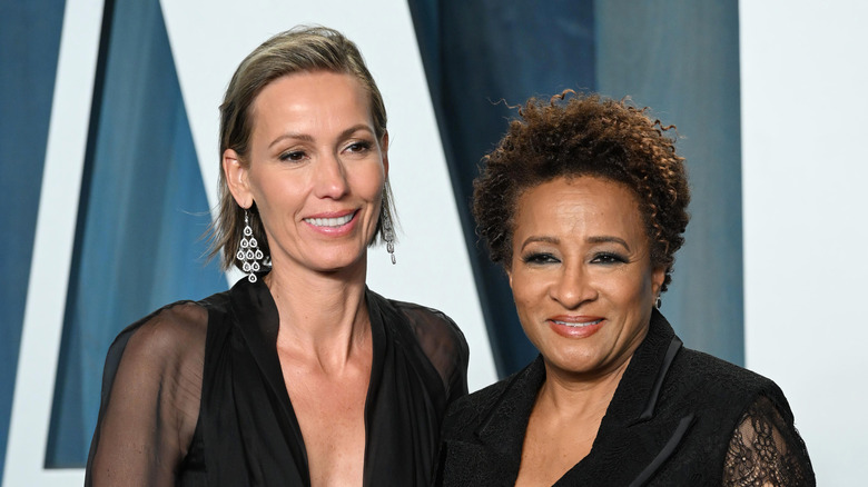 Wanda and Alex Sykes posing on a red carpet