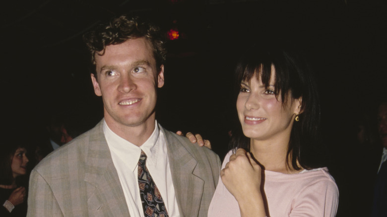 Tate Donovan and Sandra Bullock smiling