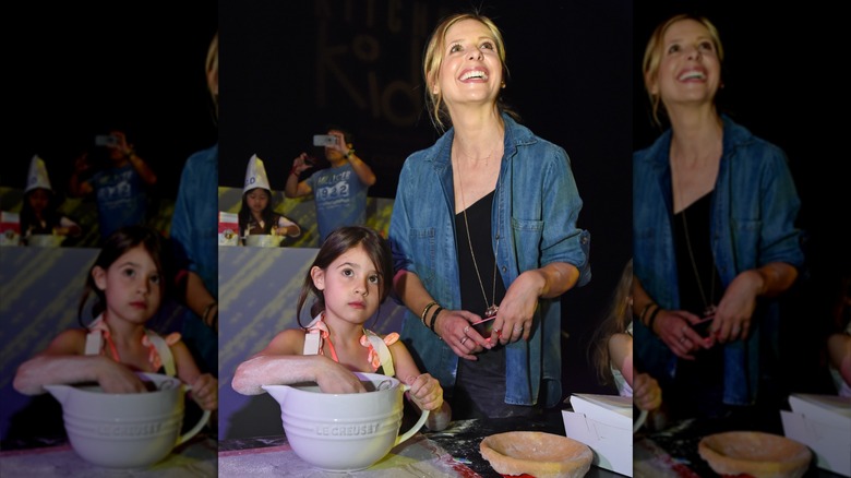 Sarah Michelle Gellar and Charlotte baking together.