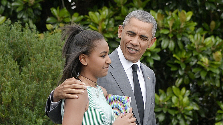 Sasha Obama and Barack Obama