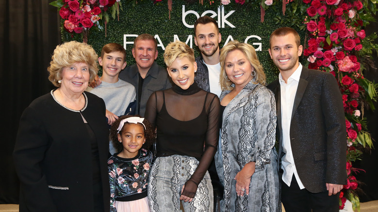 Savannah Chrisley poses with her family 