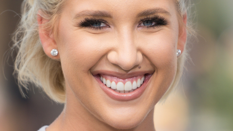 Savannah Chrisley posing for photo